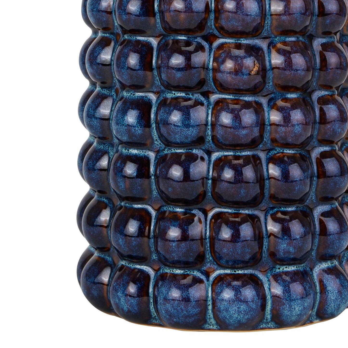 Blue textured ceramic vase on a white background