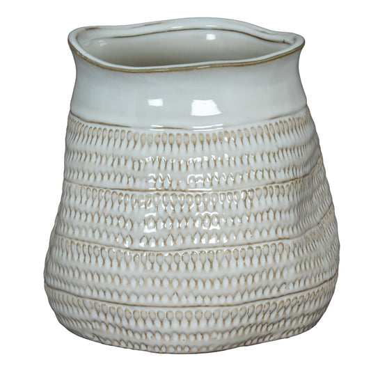 White ceramic vase with textured design on a white background