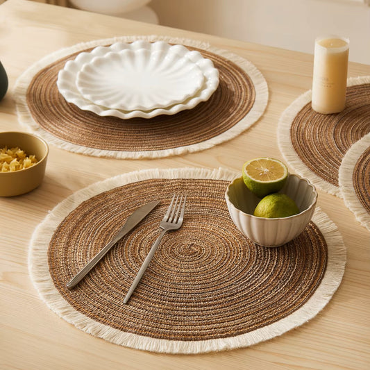 Woven placemats on a table with cutlery and food