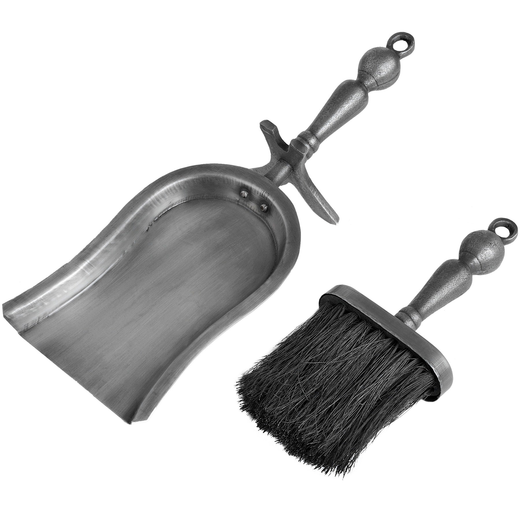 Metal dustpan and brush set on a white background