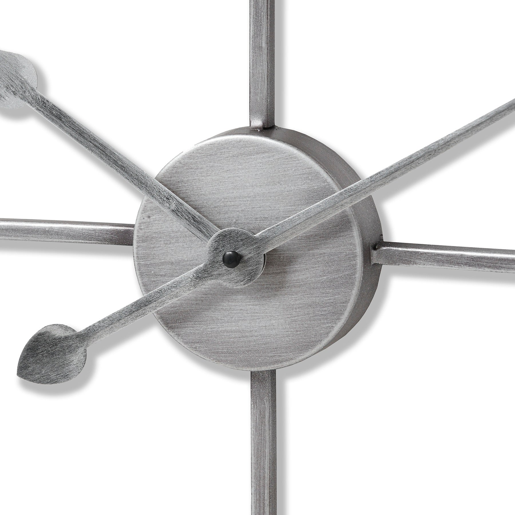 Close-up of a silver clock mechanism on a white background