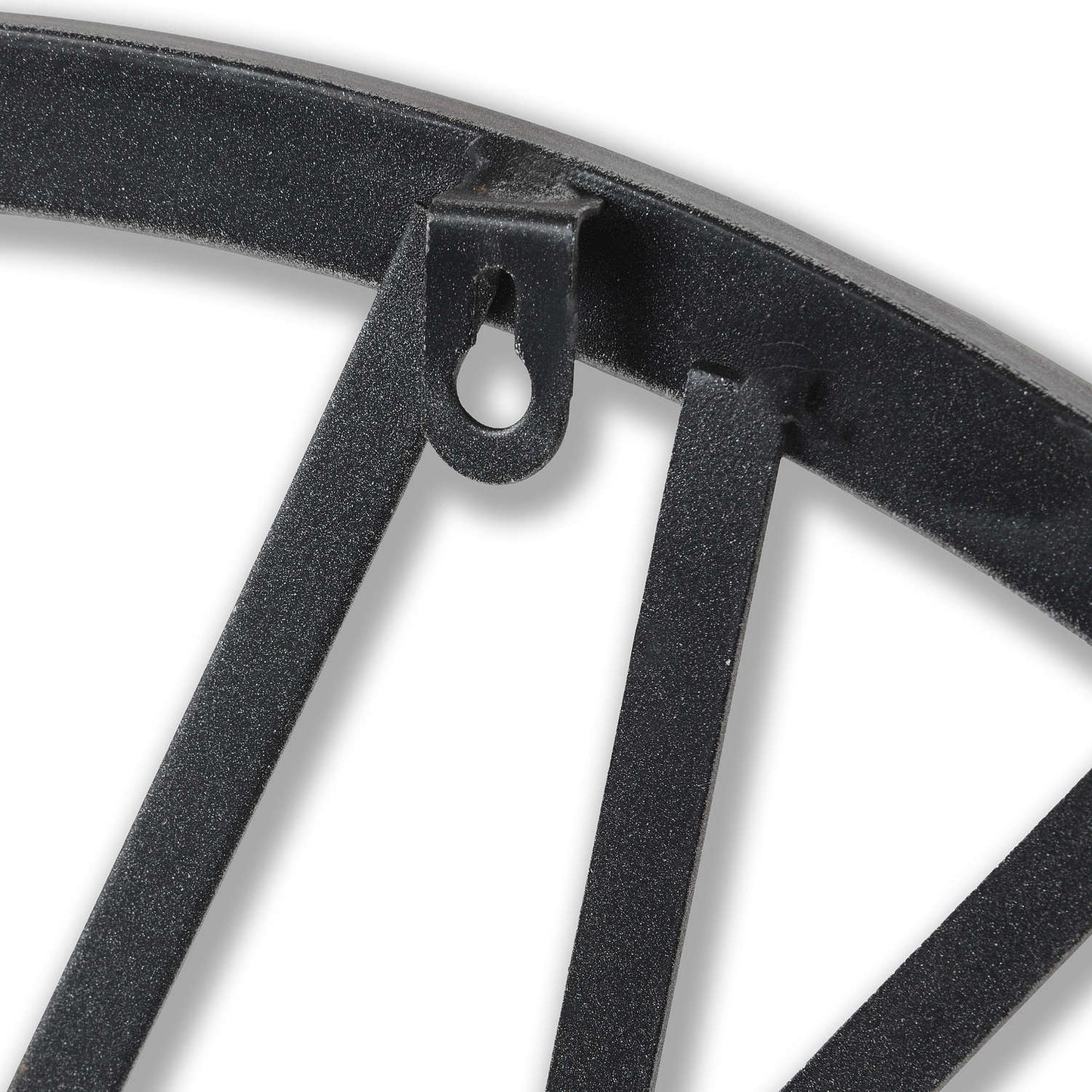 Close-up of a black metal decorative element on a white background