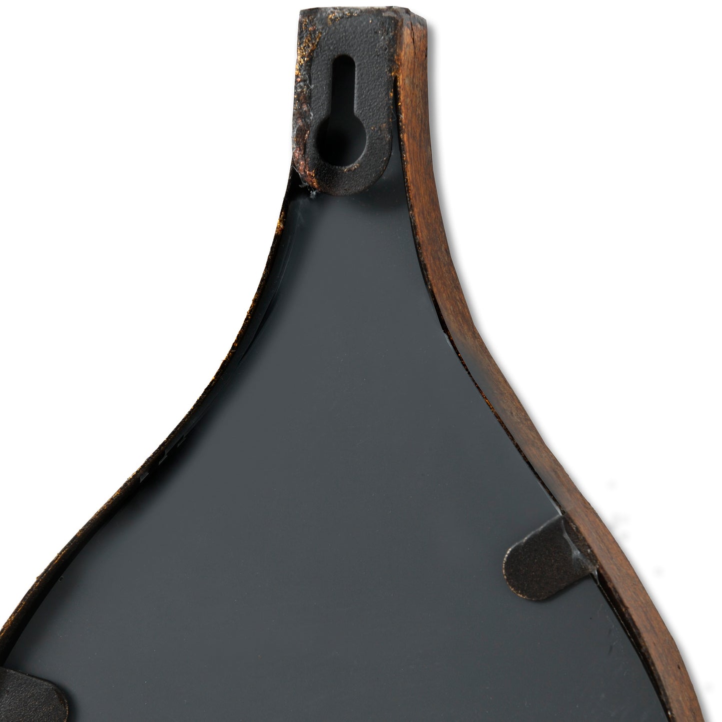 Close-up of a mirror back on a white background