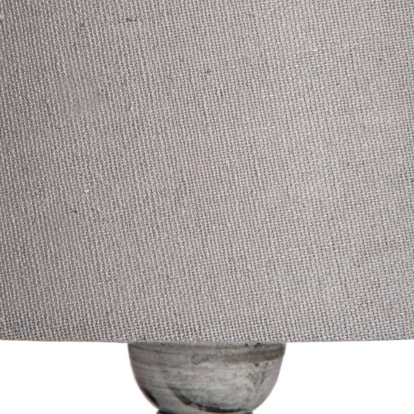 Close-up of a textured gray fabric surface