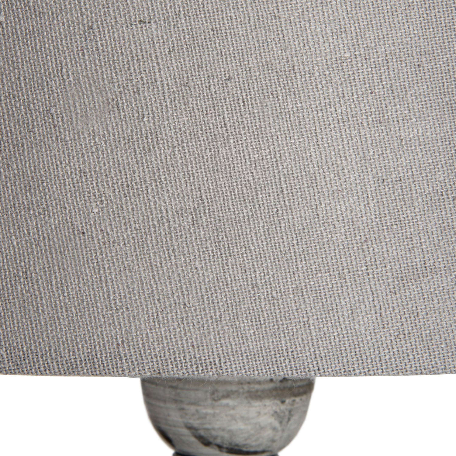 Close-up of a textured gray fabric surface