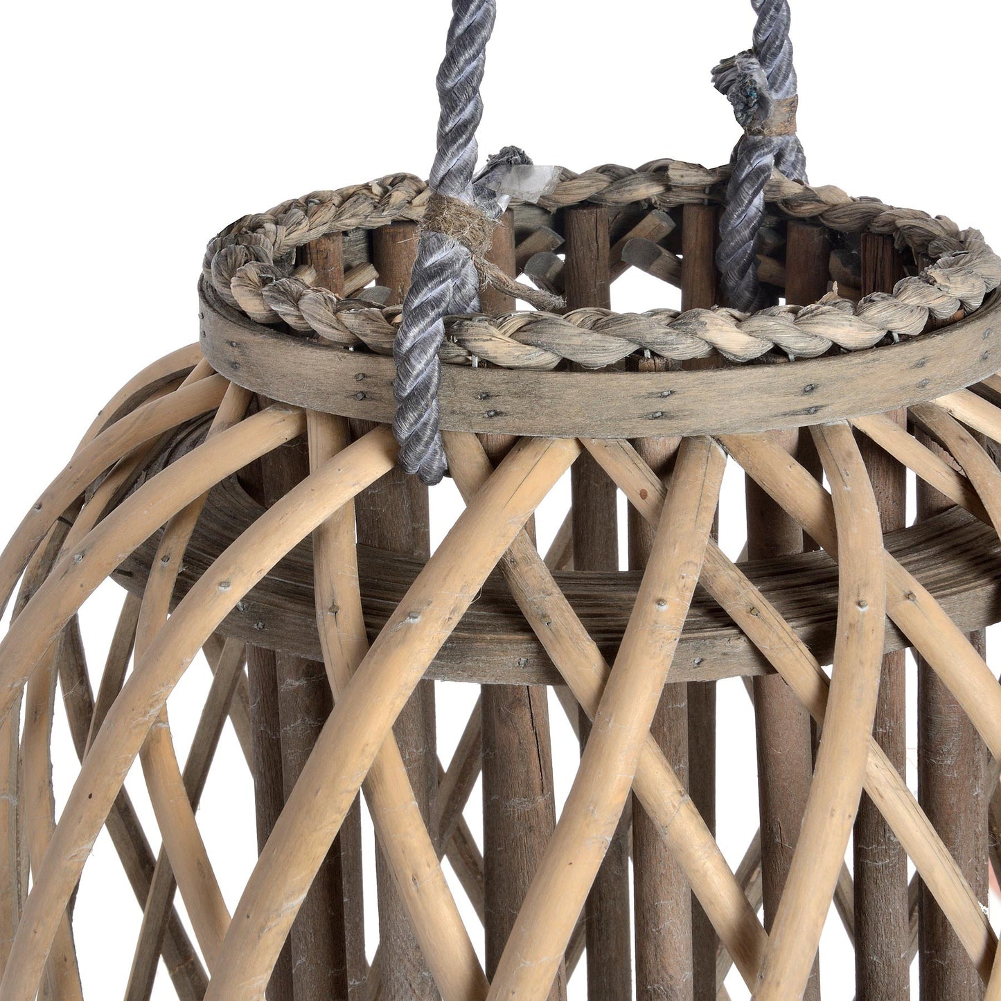 Close-up of a woven rattan basket with rope handles on a white background