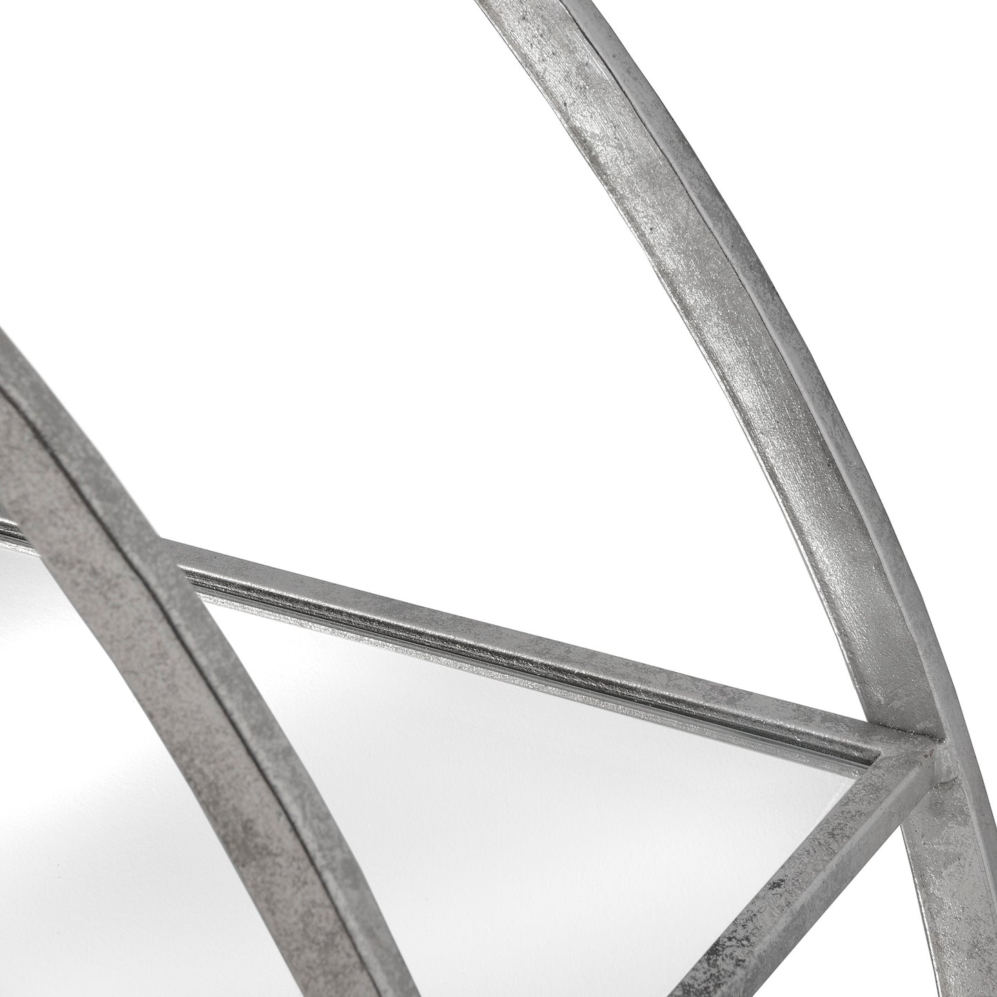 Close-up of a metallic frame with geometric design on a white background