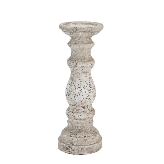 Decorative stone candle holder on a white background