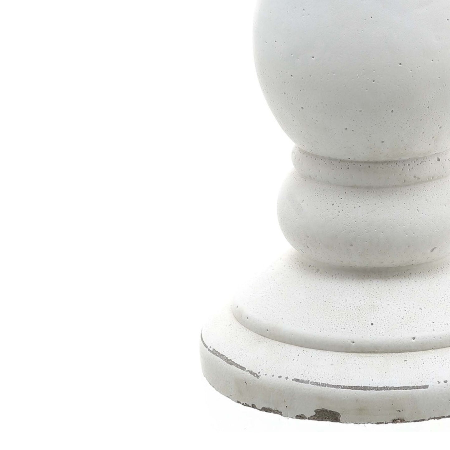 Close-up of a white decorative column on a white background