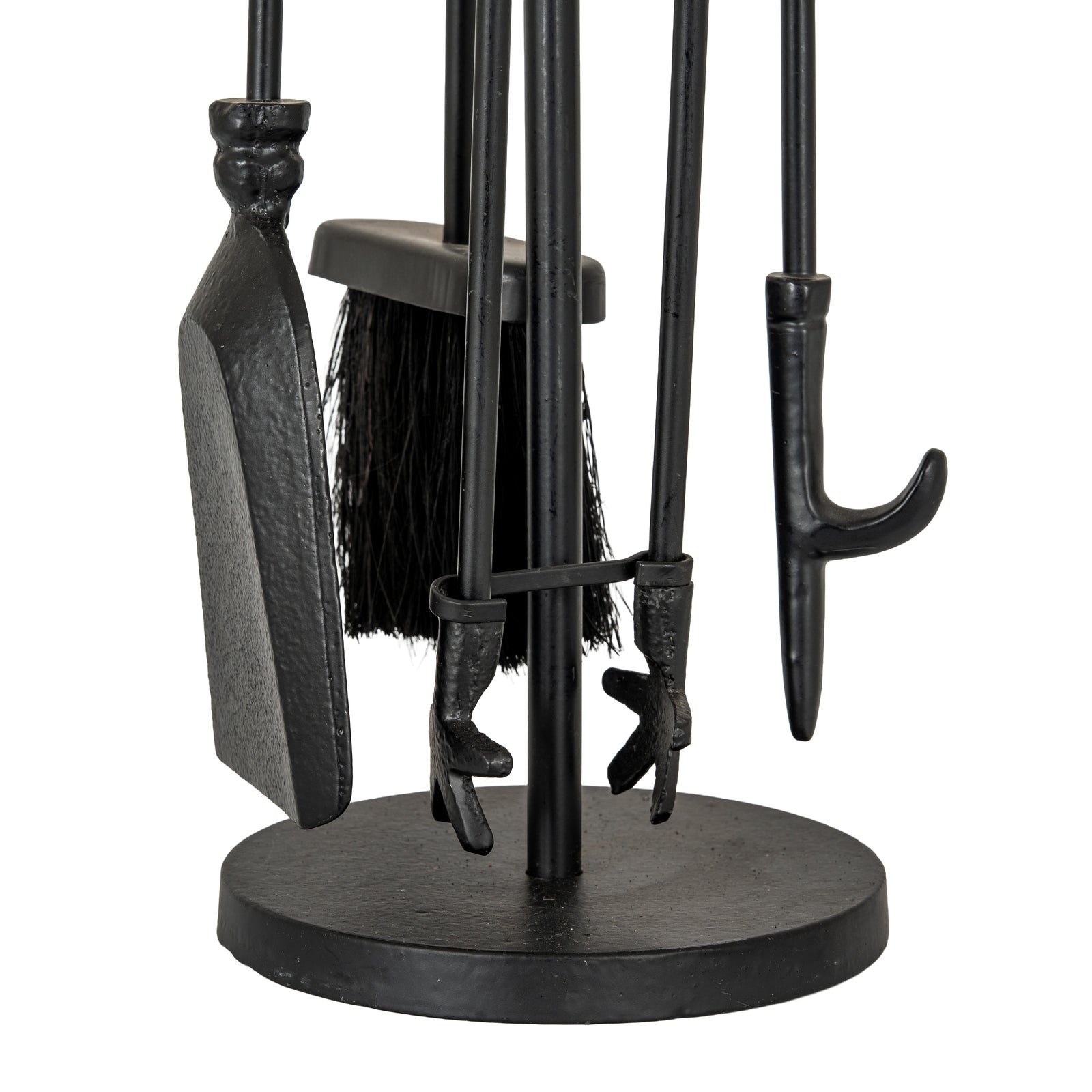 Set of black fireplace tools including a shovel, brush, and tongs on a white background