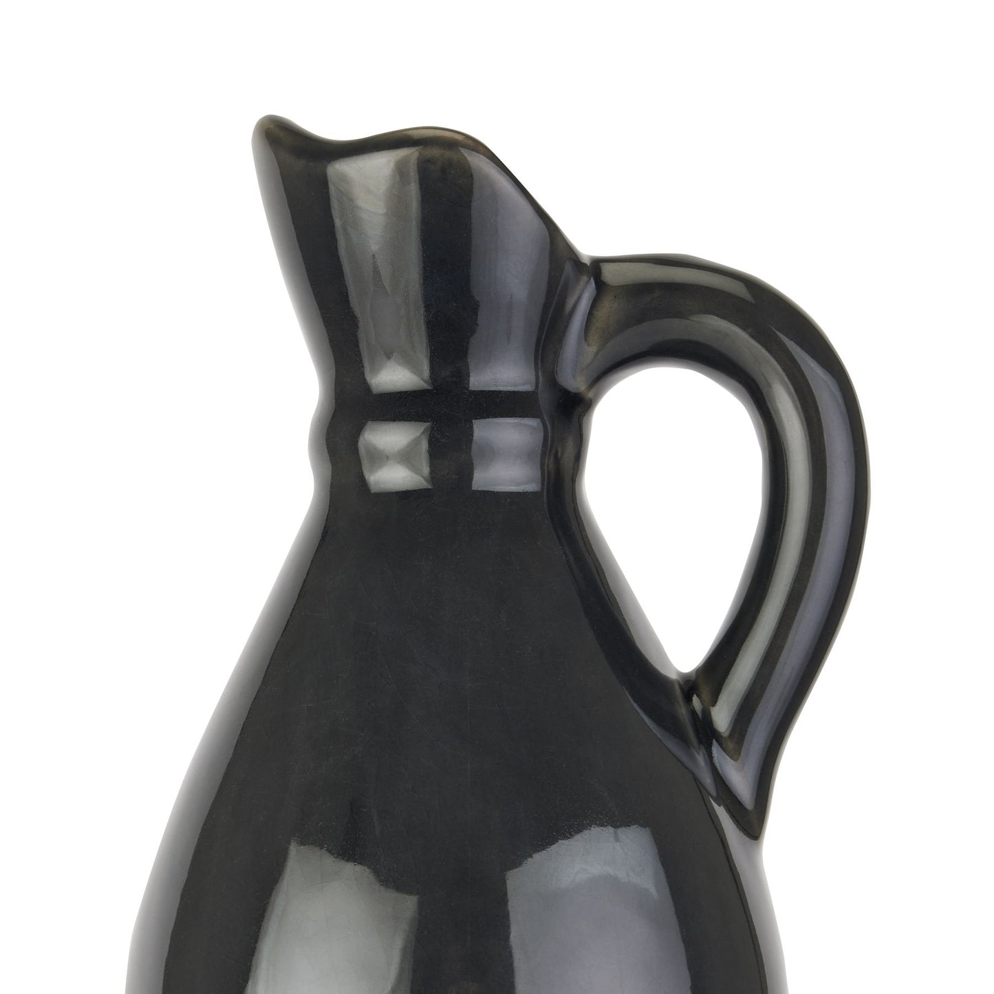 Navy blue ceramic pitcher on a white background