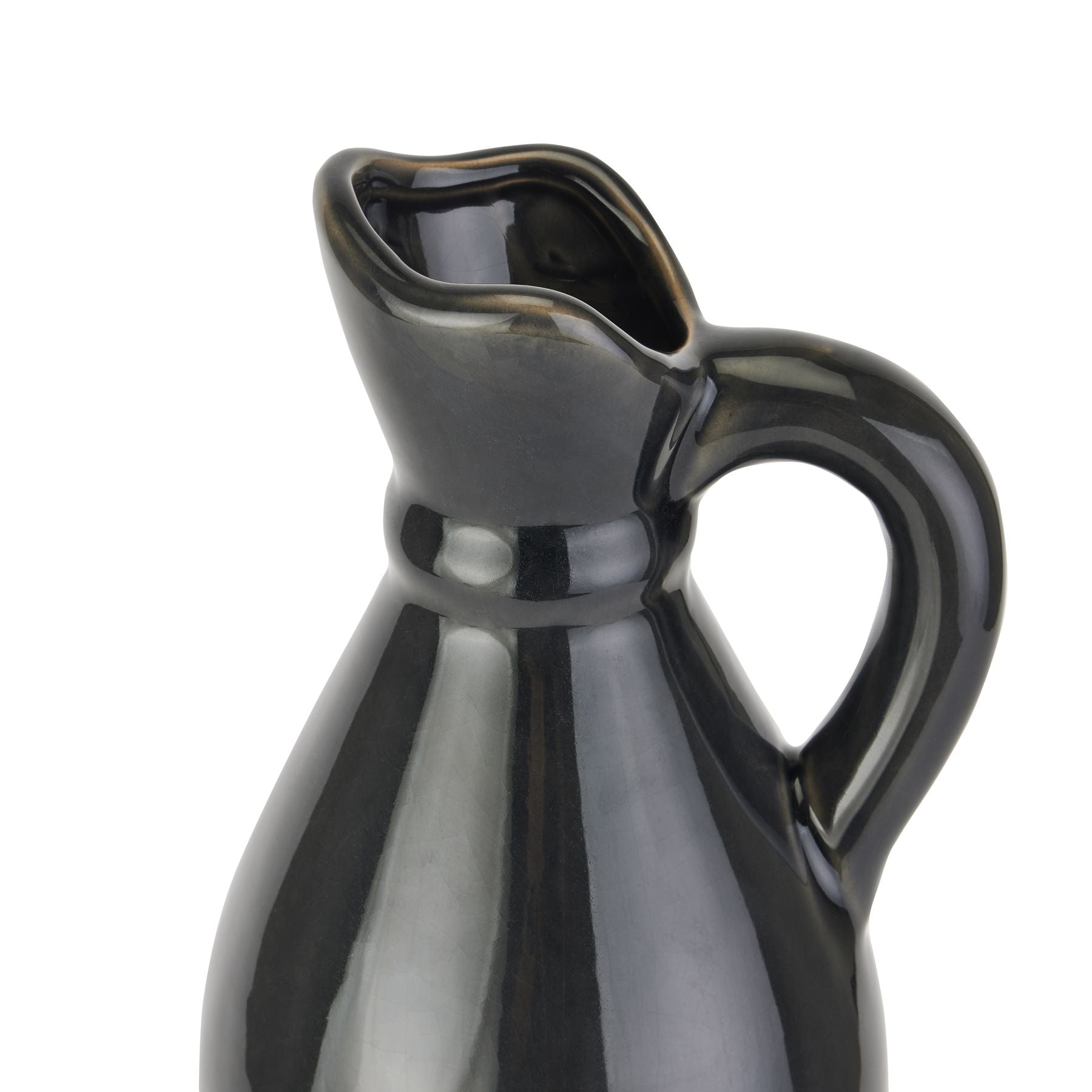 Navy blue ceramic pitcher on a white background
