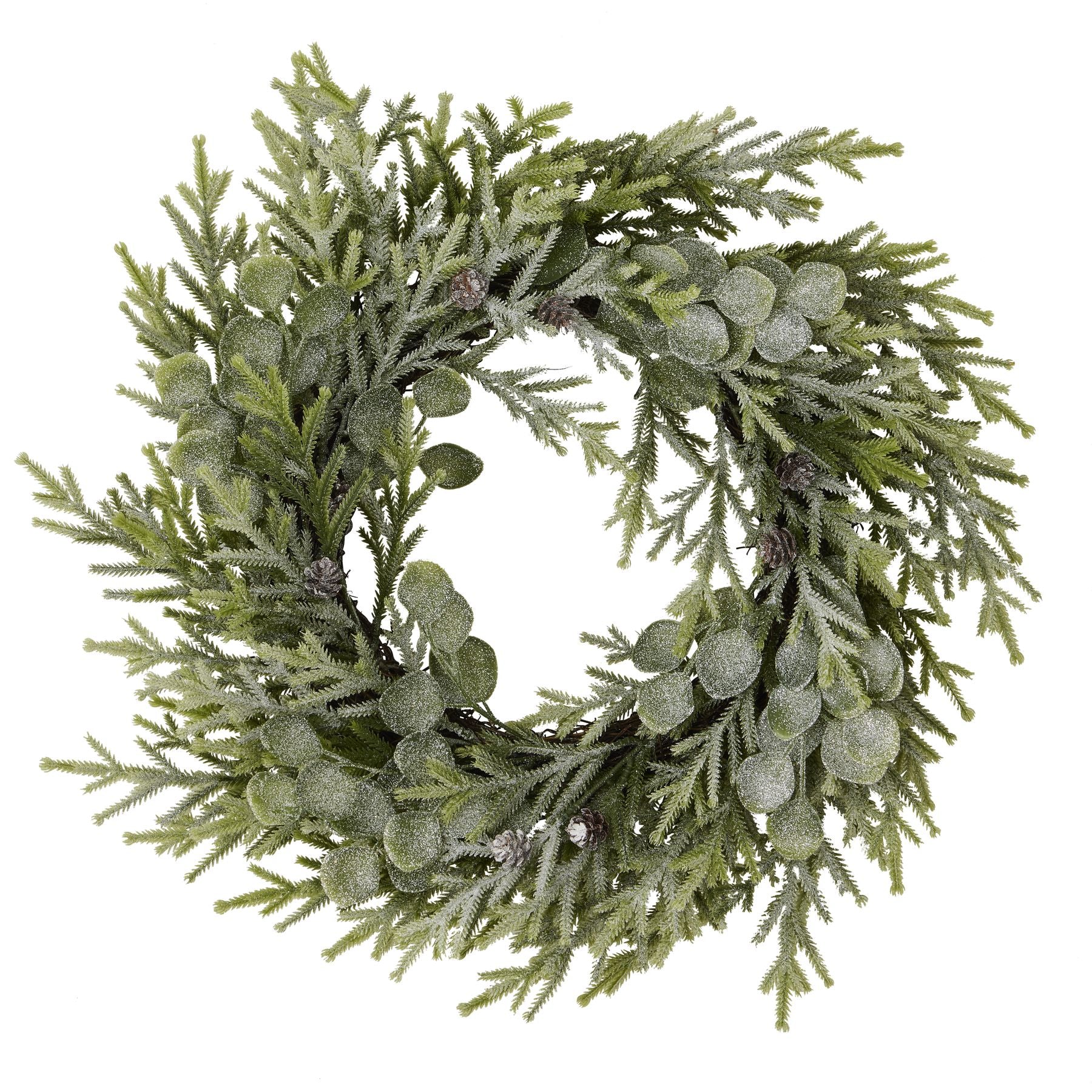 Green artificial wreath with pine needles and berries on a white background