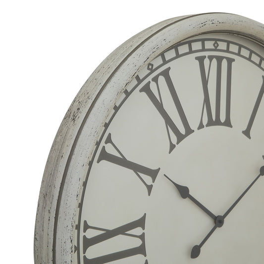 Zoom in of vintage cream and grey clock.
