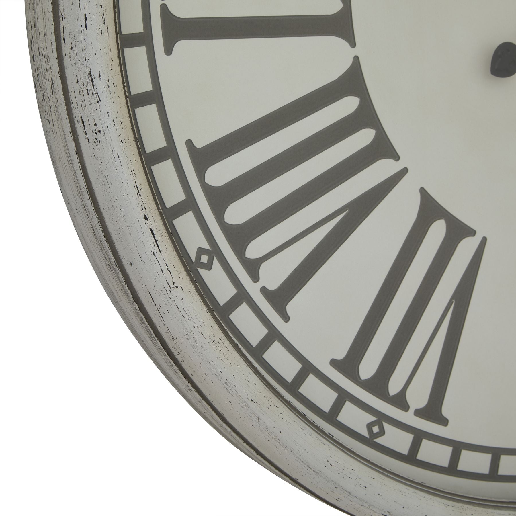 Zoom in of vintage cream and grey clock.