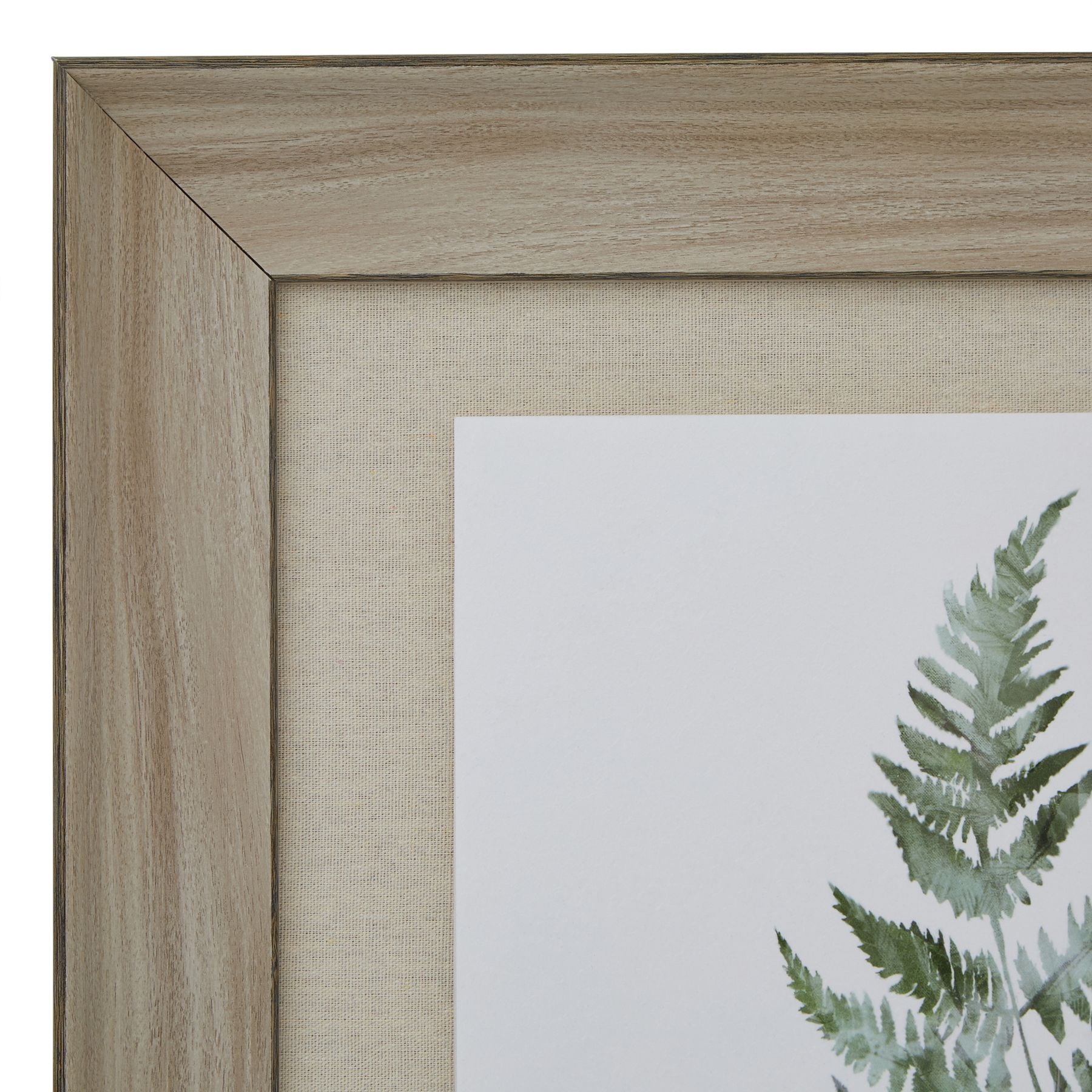 Framed artwork with a green leaf design on a white background