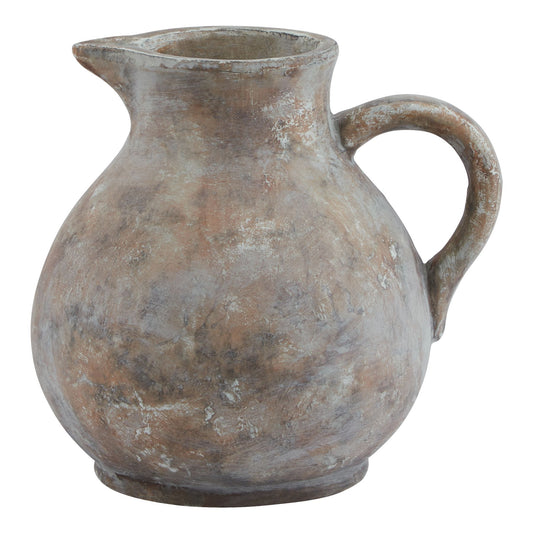 Terracotta pitcher on a white background
