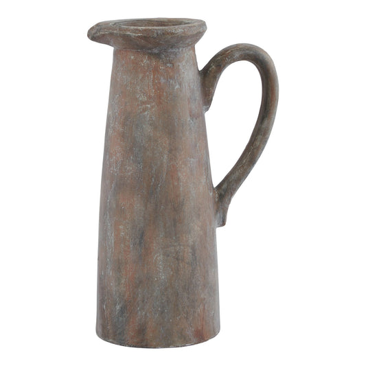 Brown ceramic pitcher on a white background