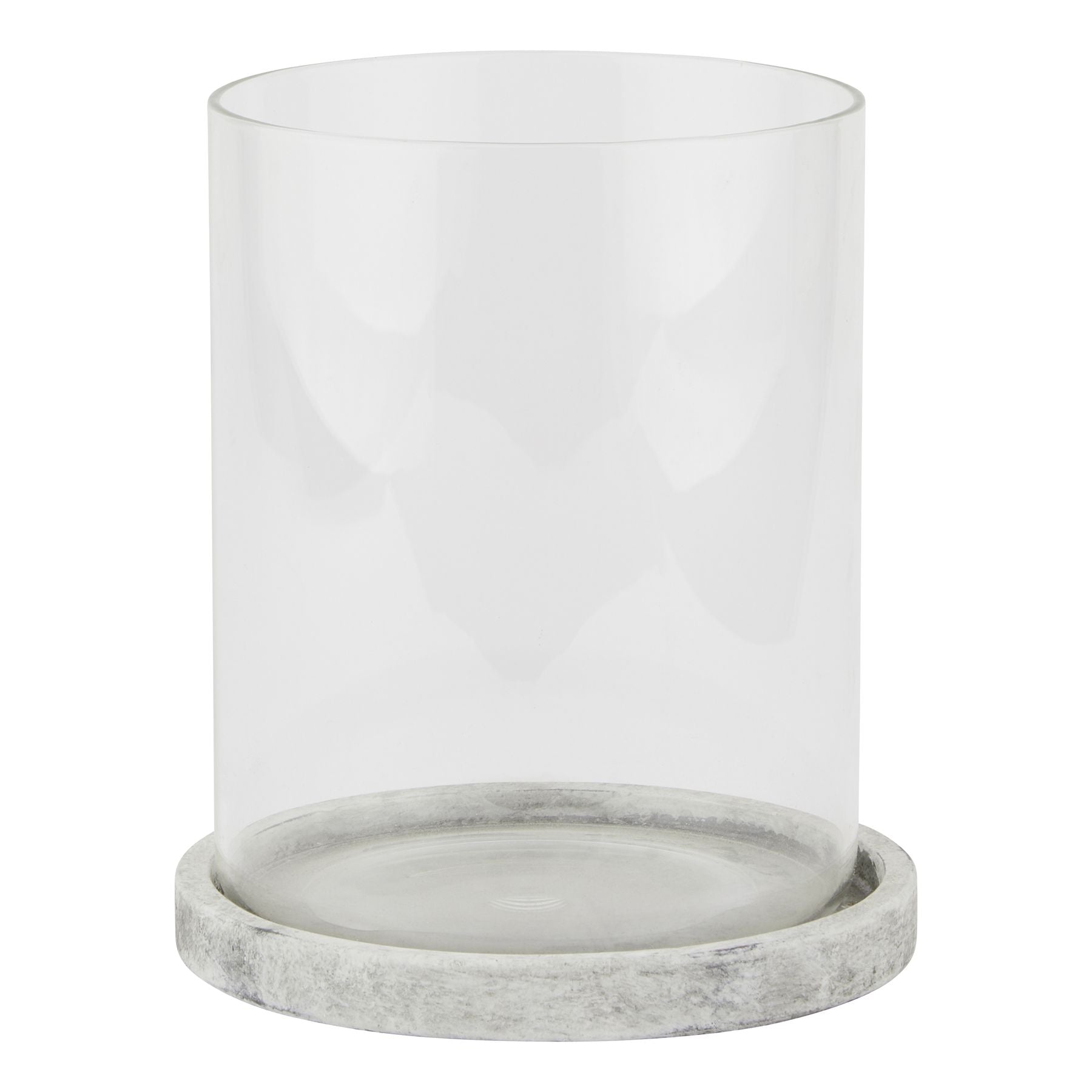 Clear glass candle holder with a gray marble base on a white background