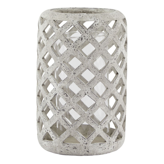 Decorative concrete lantern with lattice design on a white background