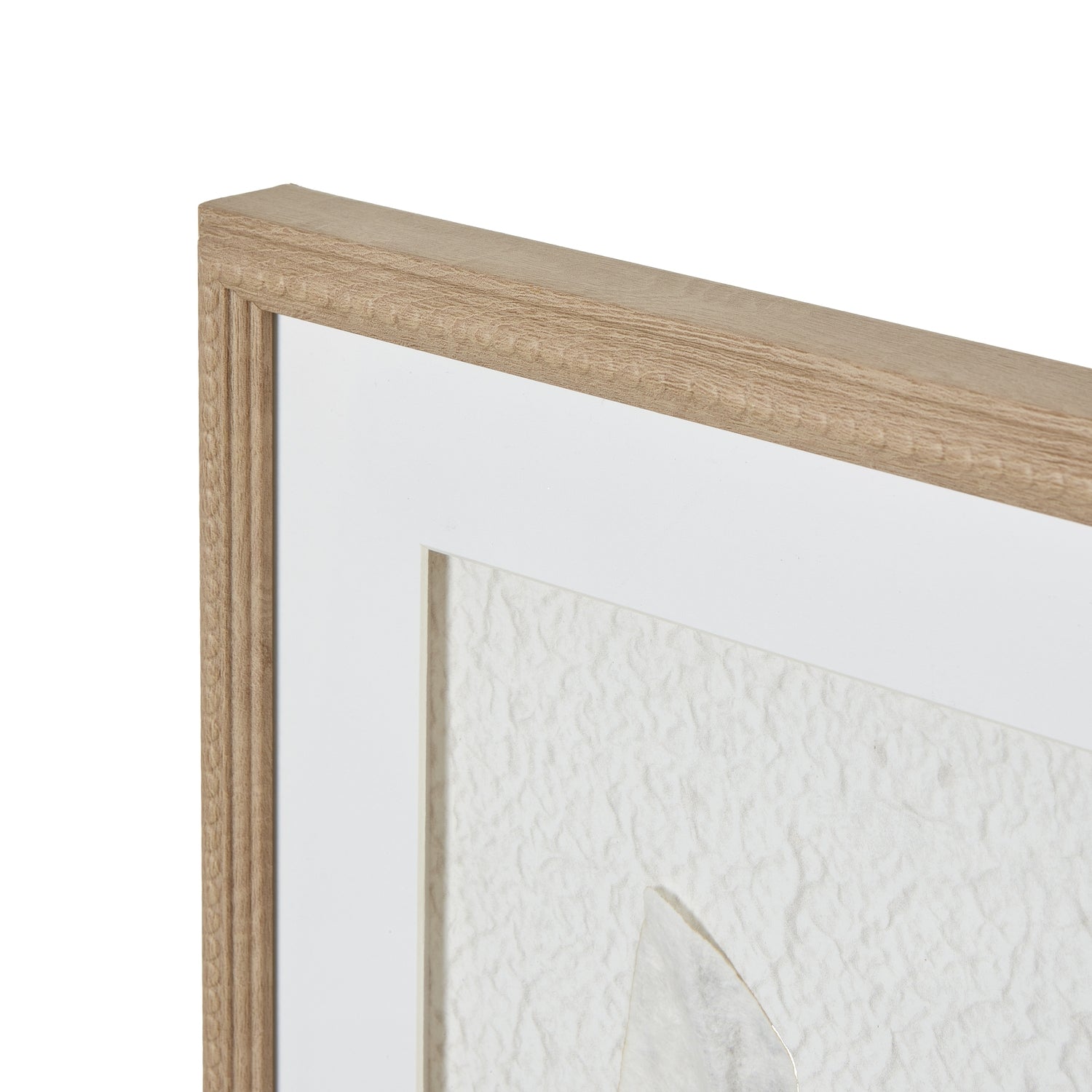 Close-up of a wooden picture frame with a white background