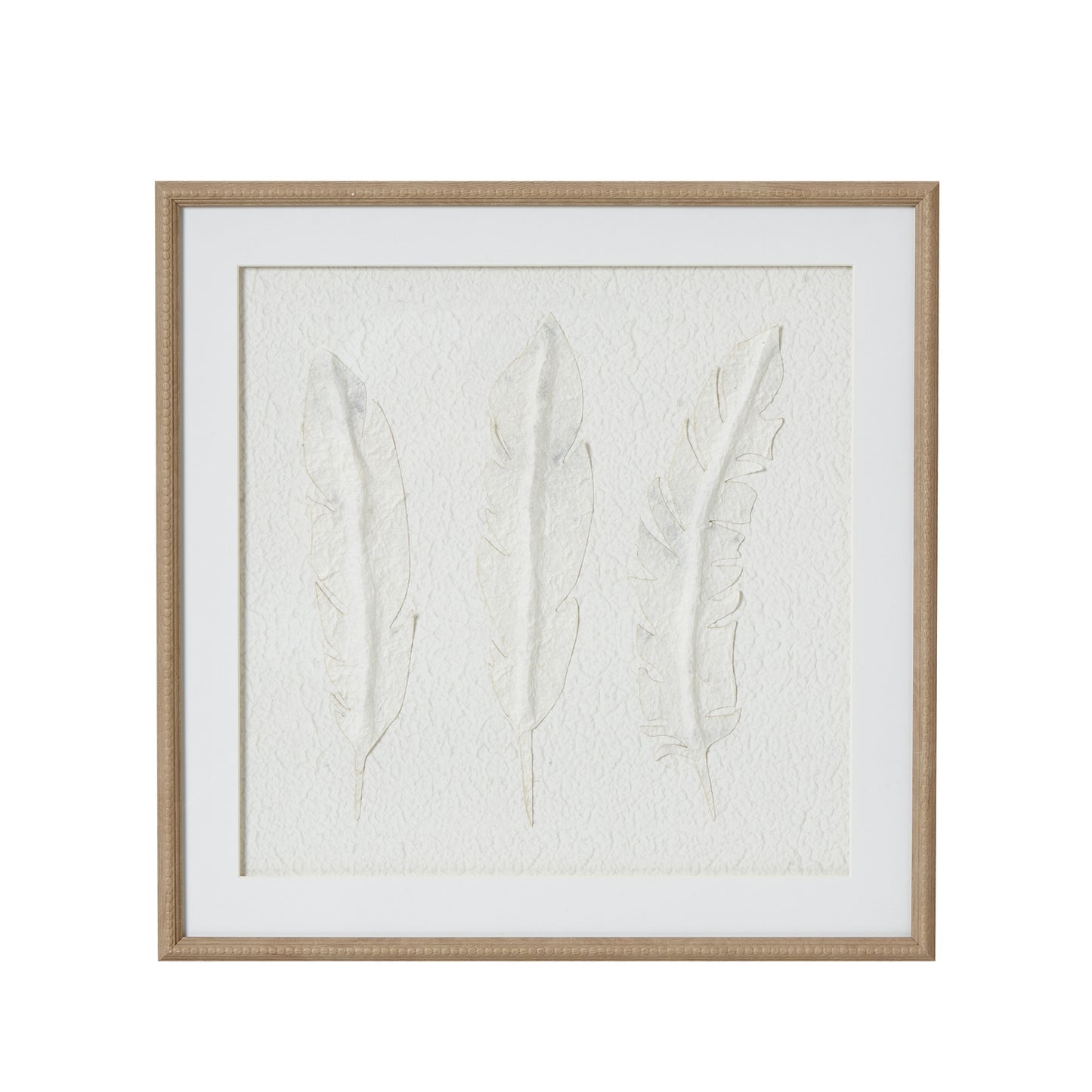 Framed artwork with embossed leaves on a white background