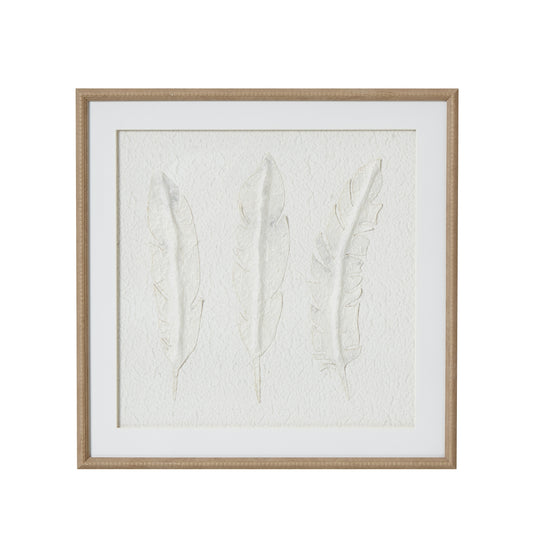 Framed artwork with embossed leaves on a white background