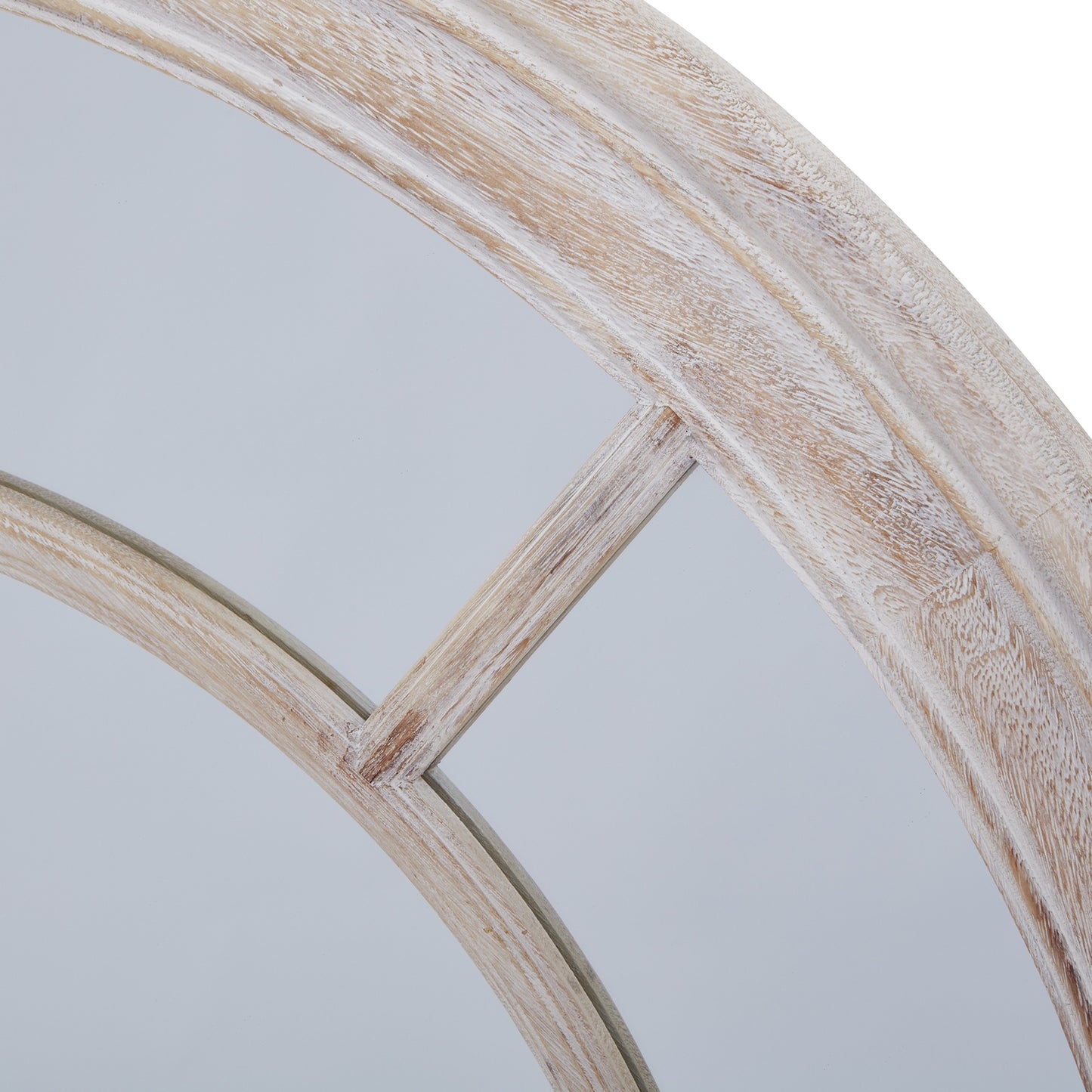 Round mirror with a wooden frame on a light gray background