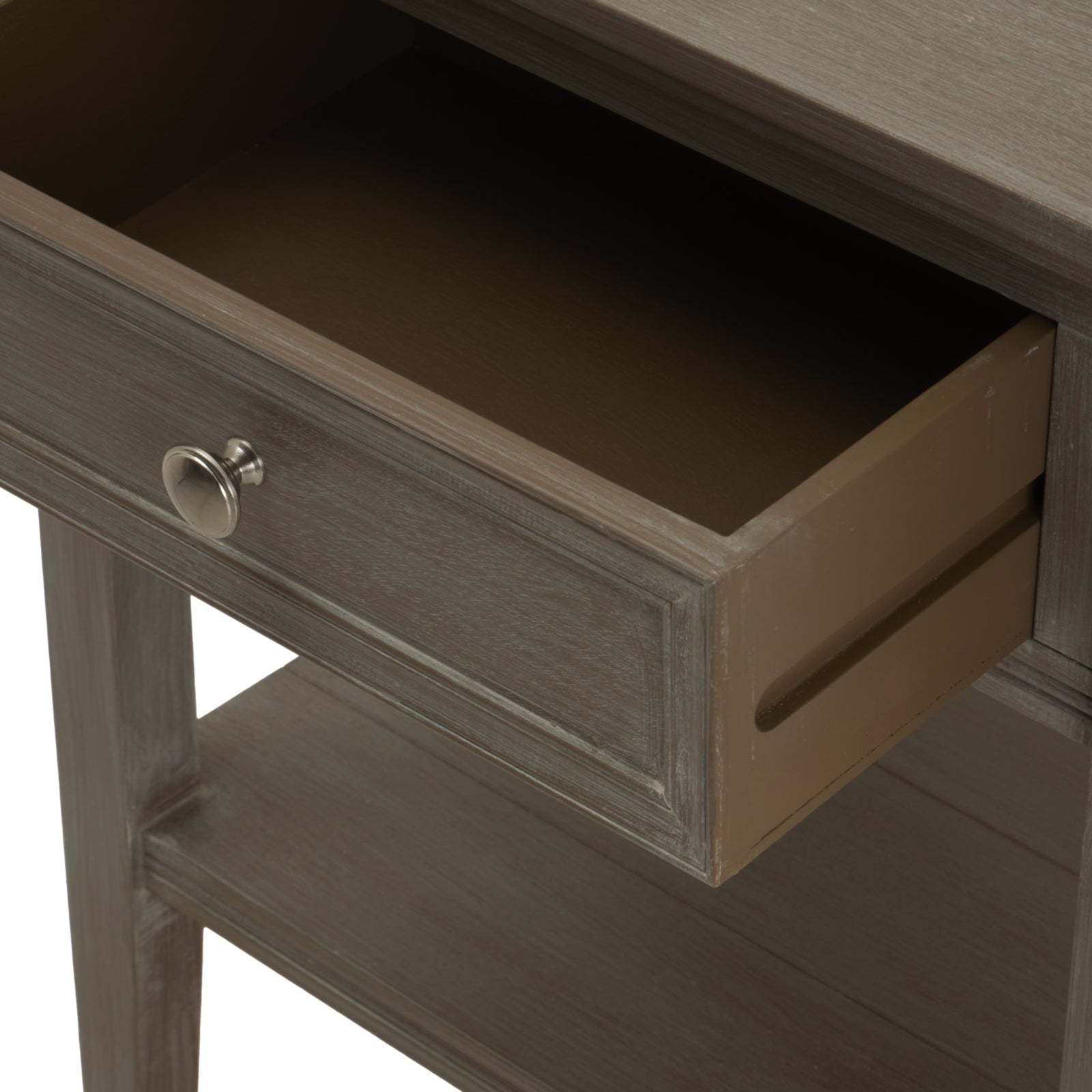 Wooden side table with a drawer open on a white background