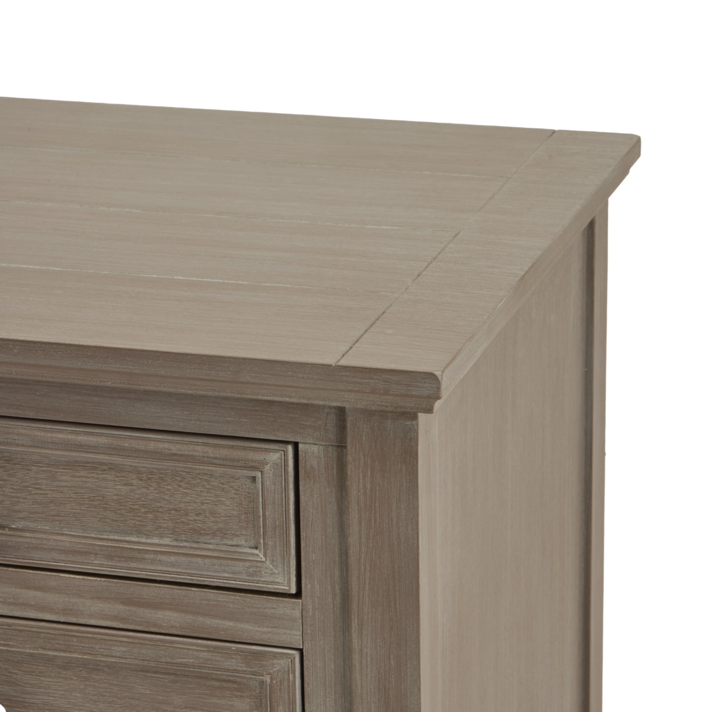 Close-up of a wooden dresser with a light brown finish on a white background