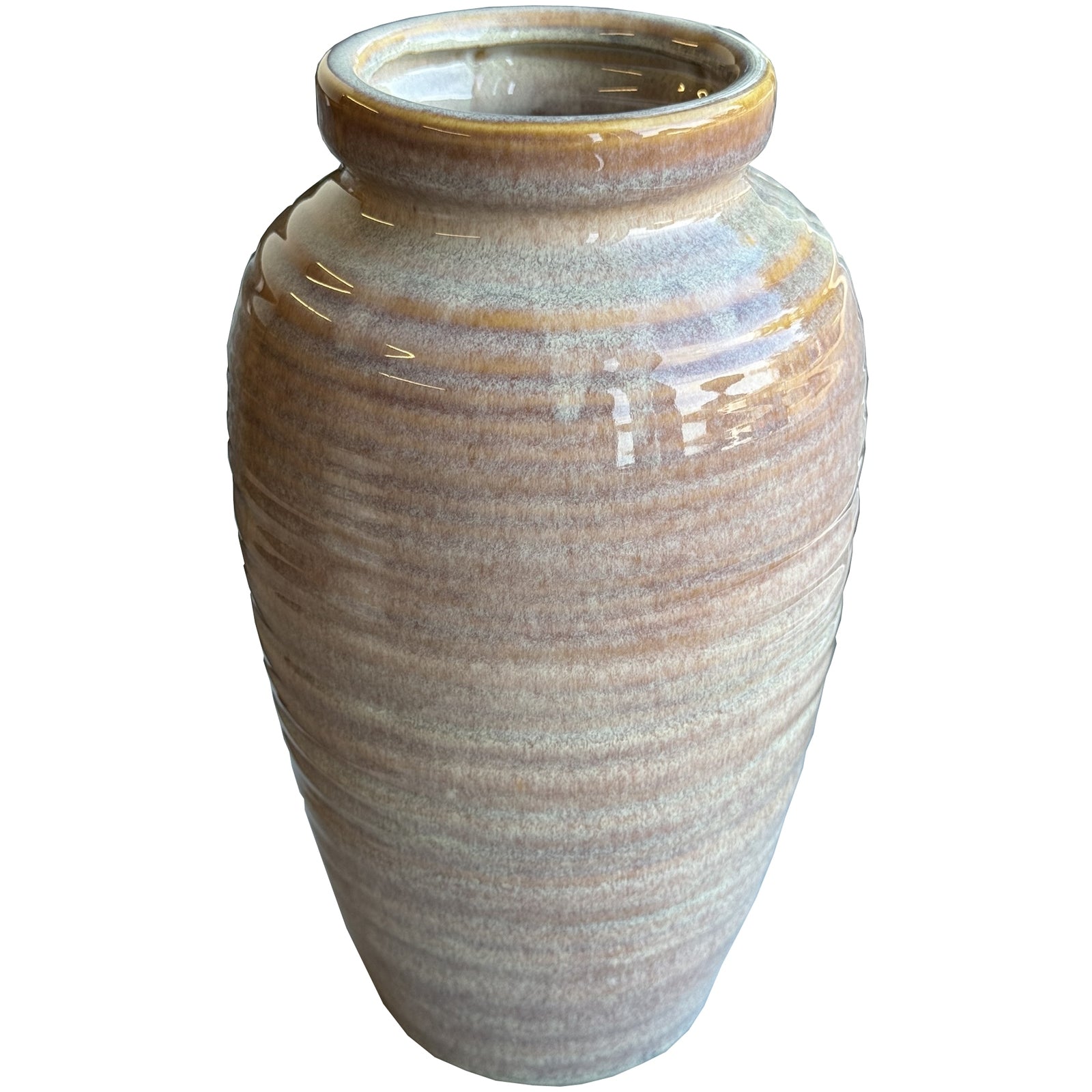 Ceramic vase with a textured surface on a white background