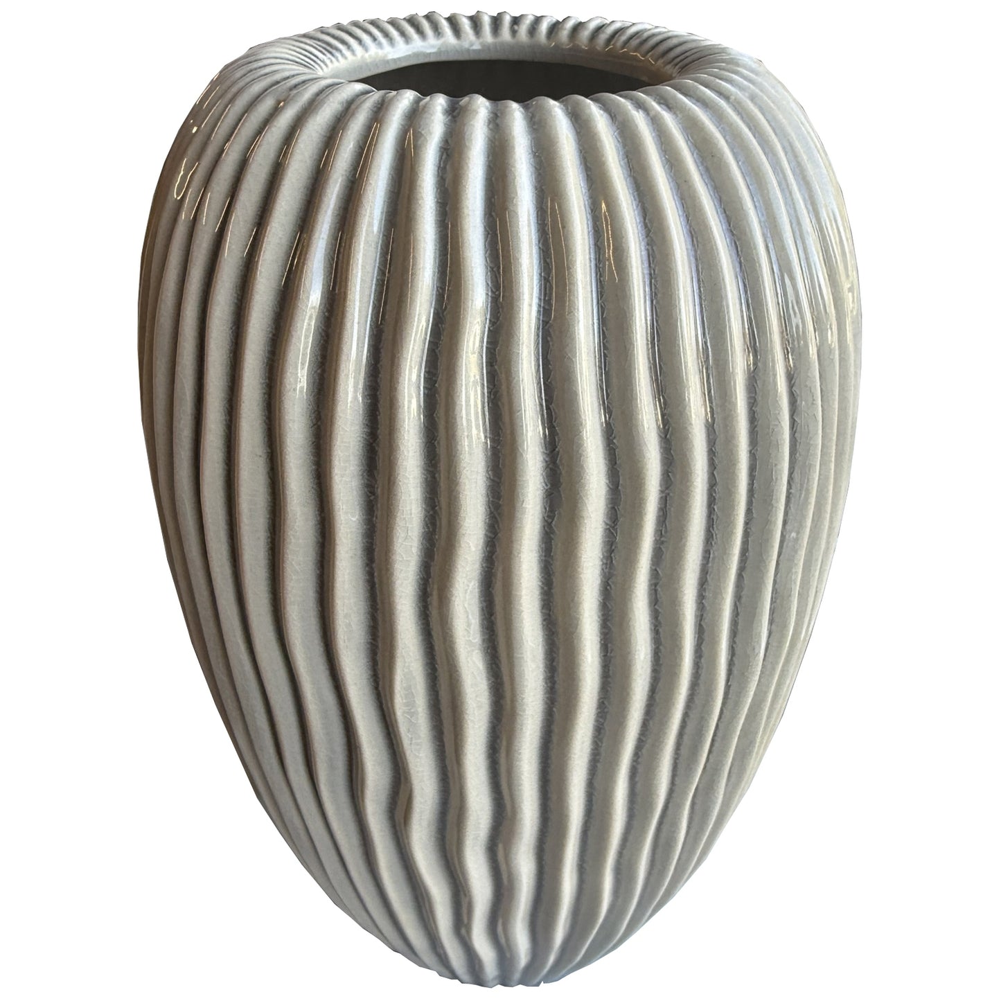 Decorative vase with ribbed texture on a white background