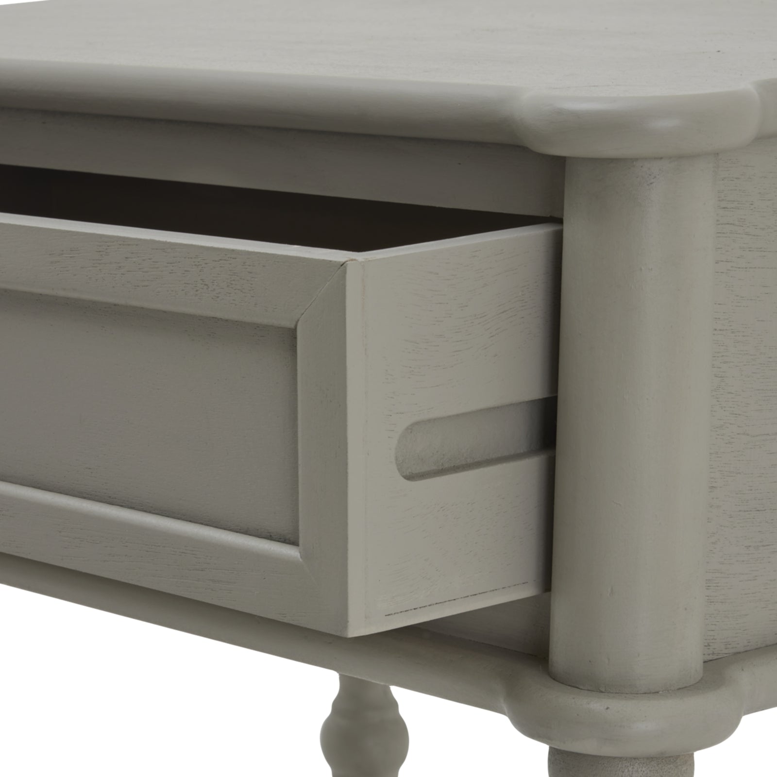 Close-up of a gray wooden side table with a drawer.