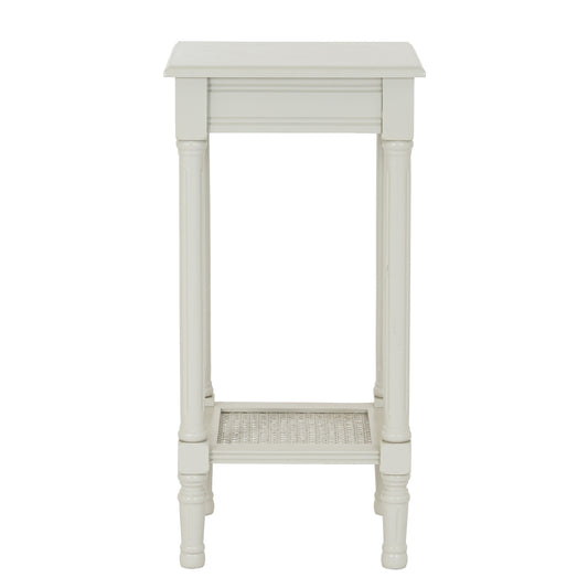 White side table with wicker shelf on a white background