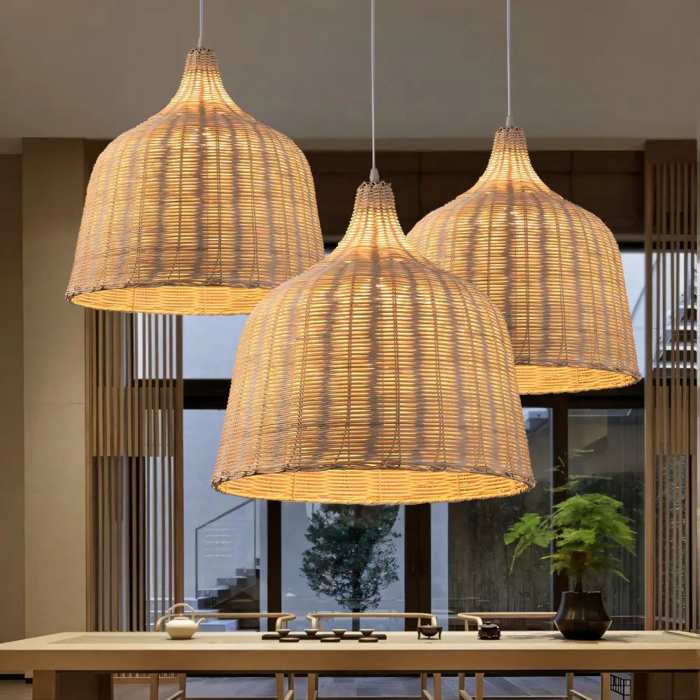 Three woven pendant lights hanging above a dining table with a modern interior background.